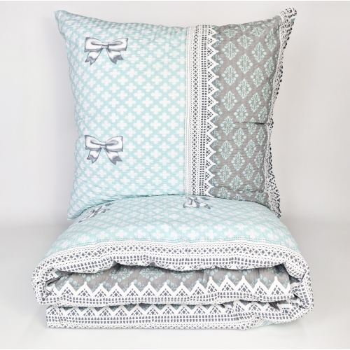 Pościel z Kory PREMIUM Lilia Wytrzymała- Turkusowe kokardki  1077, poduszka i kołdra ubrana w pościel